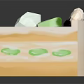 Layered Cake With Orange Yellow Layers Green Filling And White Cream Topping