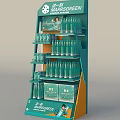 Green Beverage Display Rack With Bottles And Boxed Products In Store