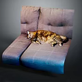 Cute Tabby Cat Lying Relaxed On Soft Purple And Blue Sofa 3d model