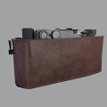 Vintage Electronic Camera With Brown Leather Case Classic Lens And Dials