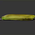 Yellow Banana with Green Stem and Dark Spots on Black Background with Reflection