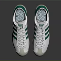 White And Green Striped Sports Shoes With Light Colored Soles And Classic Design