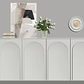 White Entryway Side Cabinet Arched Design With Vase Flowers Books Wall Art And Round Lamp
