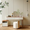 Modern Dressing Vanity With Round Mirror Cosmetics Potted Plants And Pendant Light