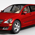 Red Mercedes Station Wagon With Black Roof And Alloy Wheels Side View