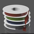 Colorful Ribbon Spools Stacked With Shiny Red Green Blue And Gray Rolls