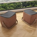 Modern Brown Fabric Stools With Black Padded Seat And Carry Handles On Wooden Floor
