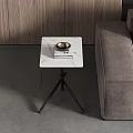 Modern Side Table With Marble Top And Black Metal Legs In Living Room