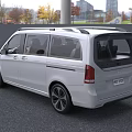 White Mercedes MPV With Modern Front Grille And Sleek Exterior Design