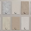 Different Colored Textured Wall Panels With White Knobs For Interior Decor