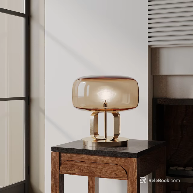 Modern Table Lamp With Amber Glass Shade And Gold Metal Base On Wooden Cabinet 3d model 