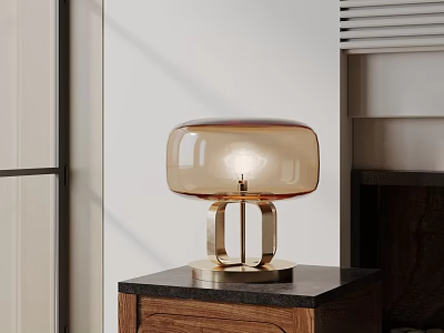 Modern Table Lamp With Amber Glass Shade And Gold Metal Base On Wooden Cabinet 3d model