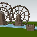 Garden Ornaments With Large Wooden Water Wheels In Water Pool Green Grass And Wooden Sign