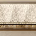 Light Colored Wavy Textured Wall With Gold Plant Decor And Modern Frame