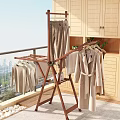 Wooden Standing Clothes Hanger with Coats Shirts and Pants in Indoor Balcony Space