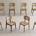 Modern Rattan Back Dining Chairs With Wooden Legs And Various Tones On White Floor