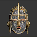 Ancient Metal Helmet With Intricate Grid Design And Decorative Facial Elements