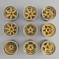 Nine Car Wheel Rims With Various Gold And Silver Designs Arranged In