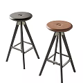 Modern Minimalist Bar Stools With Black And Brown Round Seats And Metal Frames