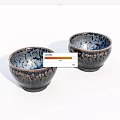 Two Dark Blue Ceramic Bowls With Crackle And Speckled Patterns On White Background 3d model