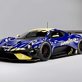 Blue And Yellow Monster Race Car With Aerodynamic Design And Rear Wing
