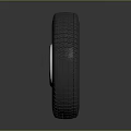 Car Tire With Silver Metal Rim And Tread Pattern On Dark Background