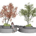 Round Landscape Seats With Red And Green Leaf Trees And Woman Sitting