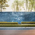 Blue Marble Feature Wall Design With Green Shrubs And Trees In Garden