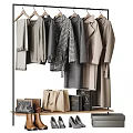 Stylish Clothing On Metal Clothes Rack With Handbags And Neutral Tones
