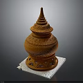 Orange Terracotta Architectural Tower With Intricate Carvings And Geometric Base
