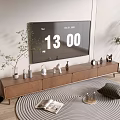 Modern TV Stand with Flat Screen TV Decorative Items Green Plants and Circular Patterned Rug