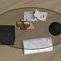 Oval Glass Coffee Table With Marble Base And Decorative Magazines On Wooden Floor