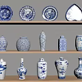 Blue and White Ceramic Wares Display On Wooden Shelves With Various Shapes Vases And Plates
