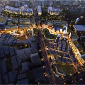 Aerial View of Urban Planning with Building Complexes Green Roofs Streets and Trees