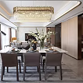 Modern Dining Living Room Interior With Crystal Chandelier Dining Table Chairs And Decorative Flowers