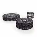 Three Modern Black Round Coffee Tables Featuring Intricate Woven Patterns 3d model