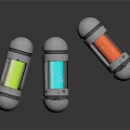 Three Cylindrical Equipment With Silver Shells And Colorful Interior Components