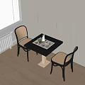 Black Dining Table Set with Rattan Chairs Placemat Vase Cups and White Cabinets