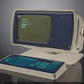Vintage Computer Monitor With Green Screen And Blue Keyboard