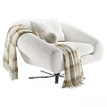 Plush Lounge Chair With Checkered Blanket Round Pillow And Metal Legs