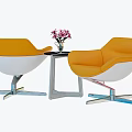 Modern Orange White Chair Table Set With Metal Legs Side Table And Pink Flower Vase
