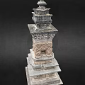 Ancient Stone Pagoda With Multiple Tiers Ornate Base Intricate Carvings And Decorative Spire