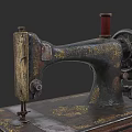 Vintage Industrial Sewing Machine with Ornate Metal Body and Red Thread Spool