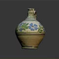 Traditional Ceramic Jug With Green And Blue Floral Patterns And Curved Handle