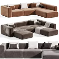 Modern Modular Sectional Sofa With Pillows And Throw Blankets In Neutral Tones For Living Room