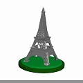 Detailed Eiffel Tower Model With Green Circular Base And Metallic Structure