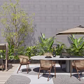 Outdoor Table and Chair Set with Umbrella Lush Plants and Gray Wall