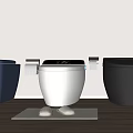 Three Colored Toilets With Digital Display Toilet Paper Holders And Mat On Wooden Floor