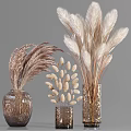 Decorative Transparent and Gold Vases with White Blossoms Pampas Grass and Seed Pods
