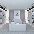 Modern CANDISTAR Showroom Displaying Home Appliances And Various Products With Central White Exhibition Counter